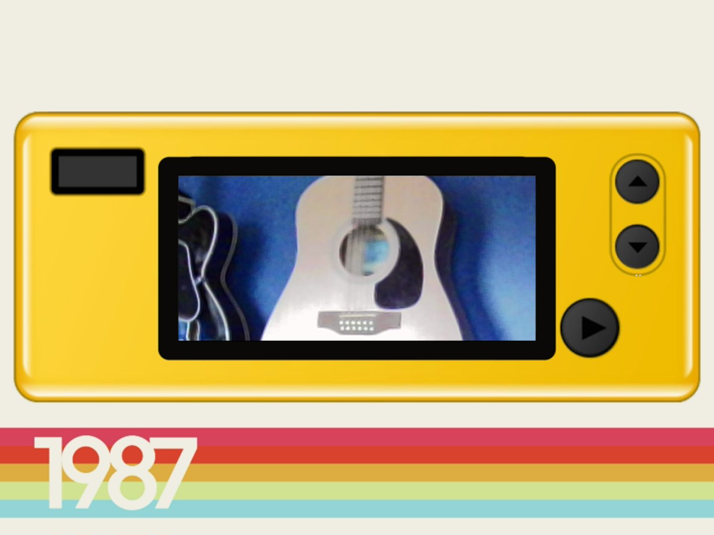 A yellow mini camera with a viewfinder trained on an acoustic guitar. Under it is a rainbow stripe with 1987 emblazoned on it. A yellow mini camera with a viewfinder trained on an acoustic guitar. Under it is a rainbow stripe with 1987 emblazoned on it