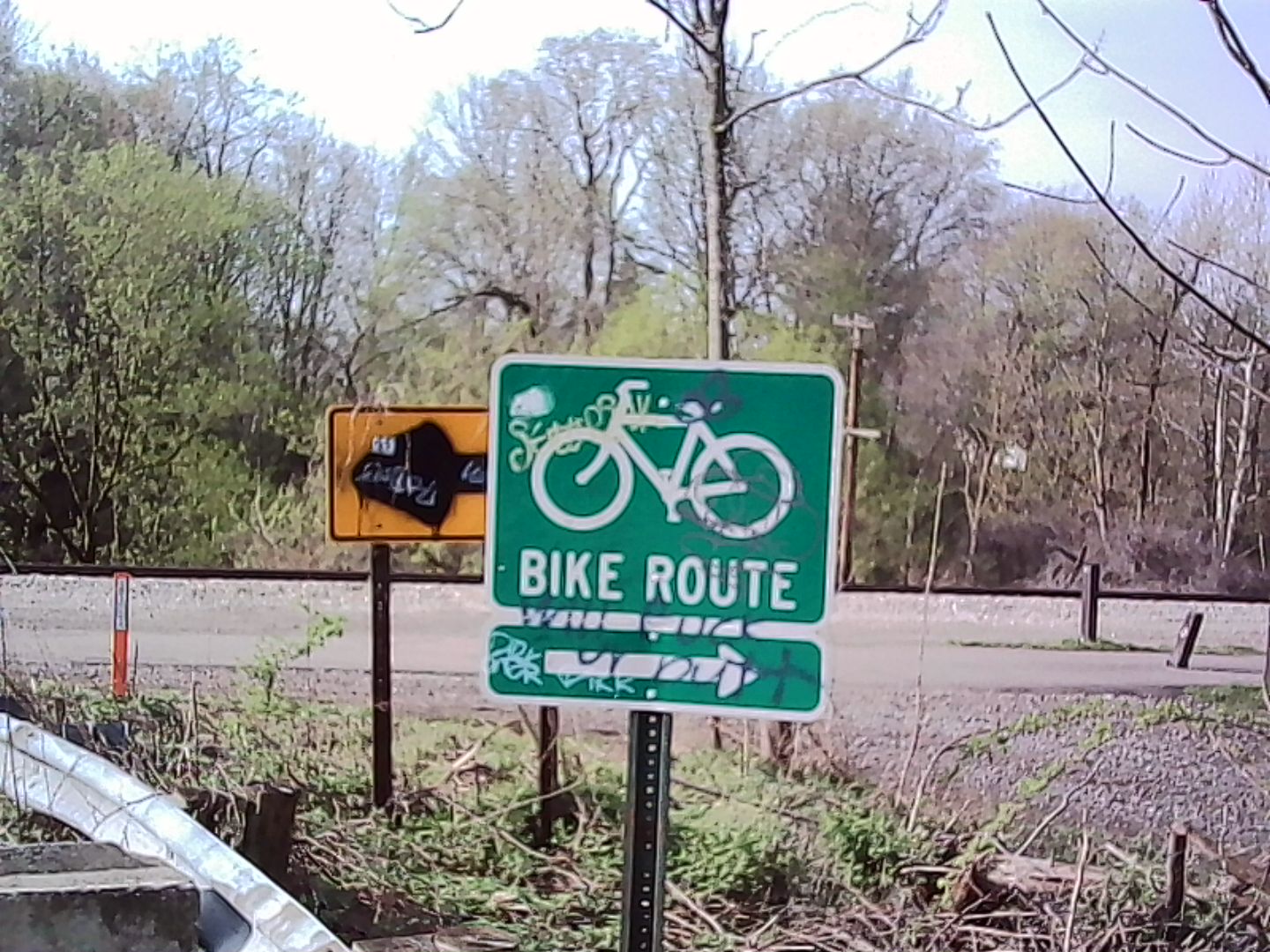 Tagged up bike trail signage. A tagged up sign for the bike trail