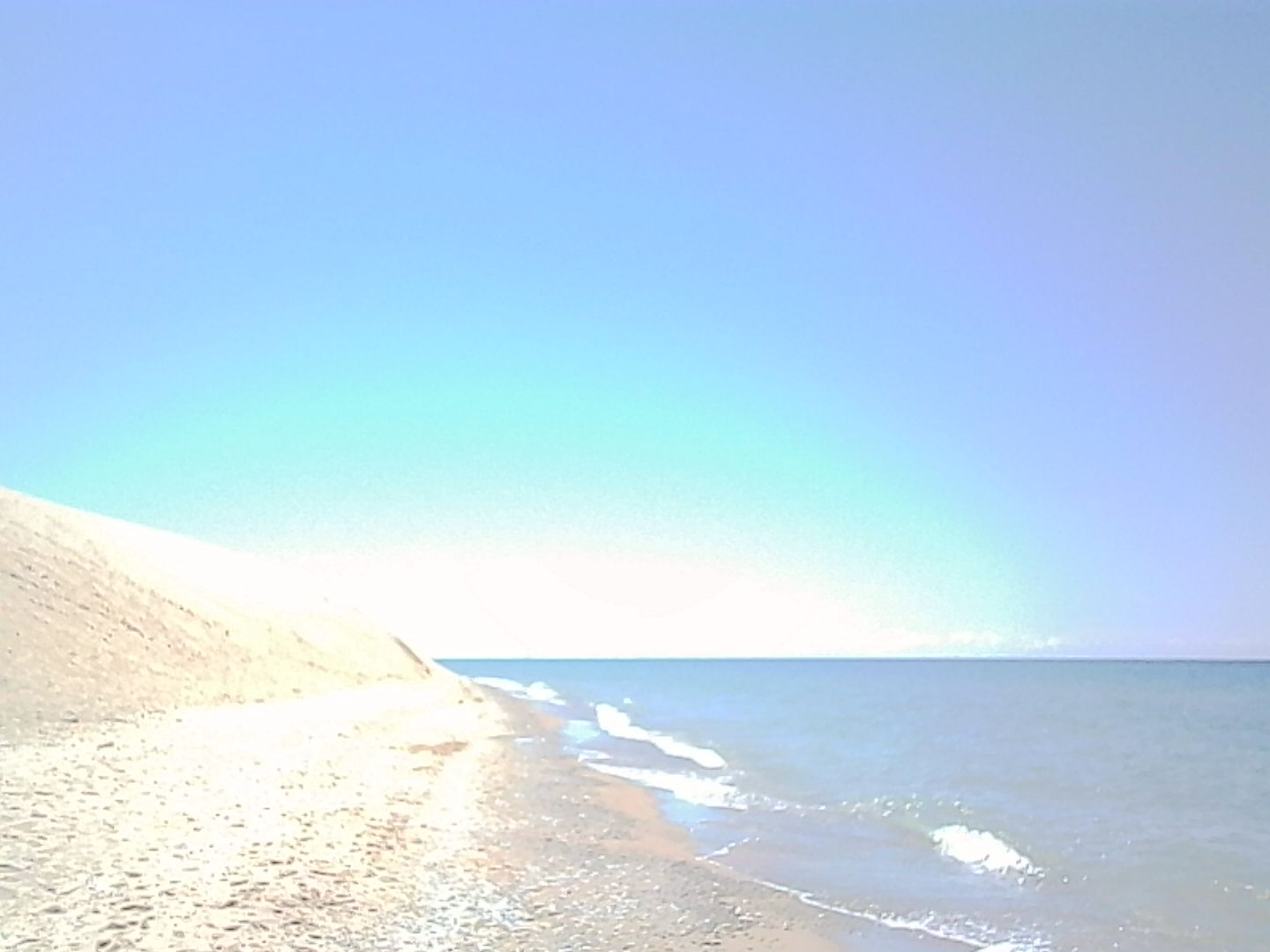 Lake Michigan coast against dunes. Lake Michigan coast against dunes